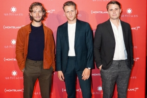 PARIS, FRANCE - OCTOBER 08: Toby Regbo, Josh Dylan and a guest attend the Montblanc: (Red)Launch Dinner and Party at Monsieur Bleu on October 08, 2019 in Paris, France. (Photo by Edward Berthelot/Getty Images For Montblanc)