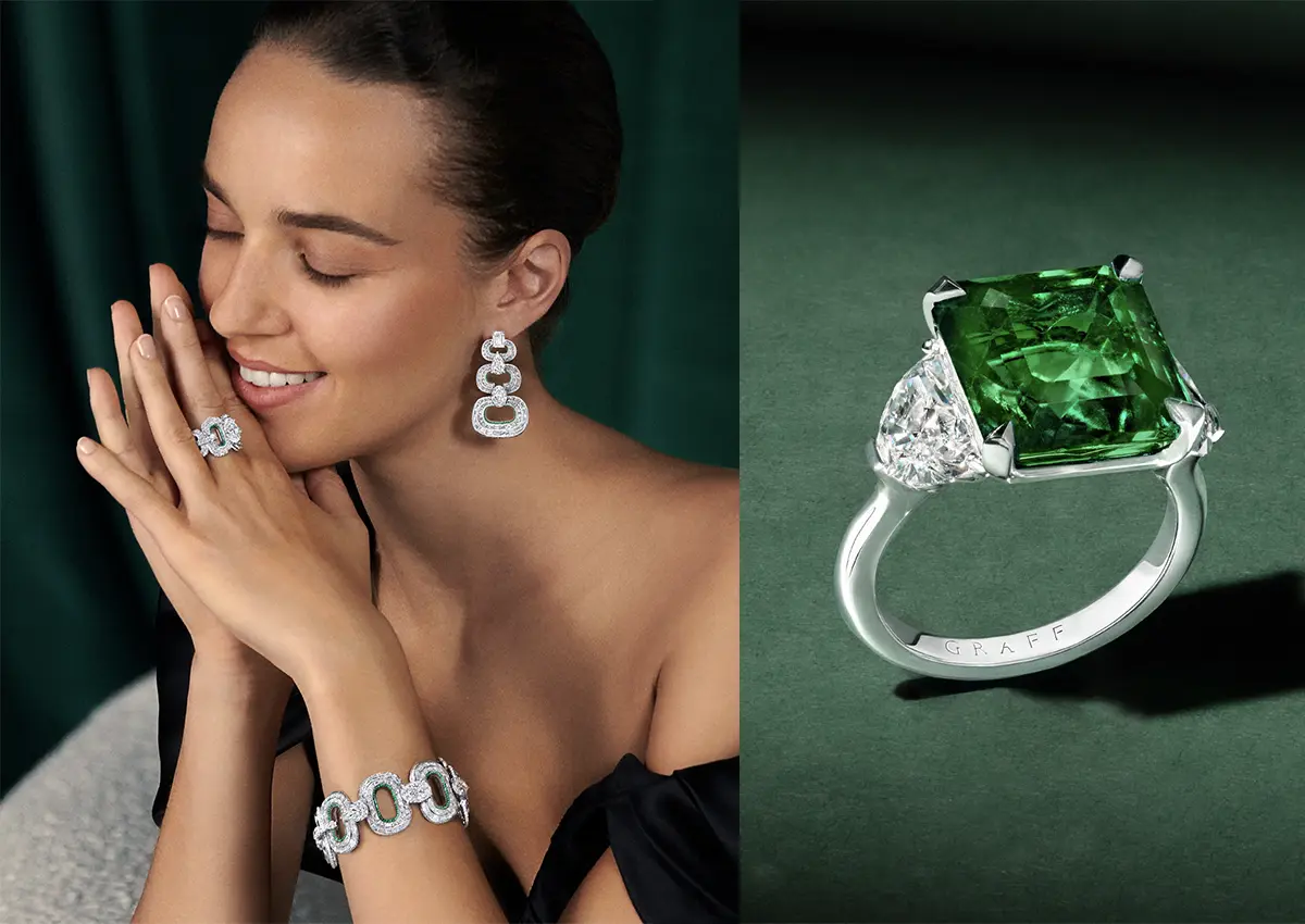 Model nosi visok nakit Graff z belimi diamanti, ob njej pa je prikazan prstan Graff s smaragdom in stranskimi diamanti na zeleni podlagi.