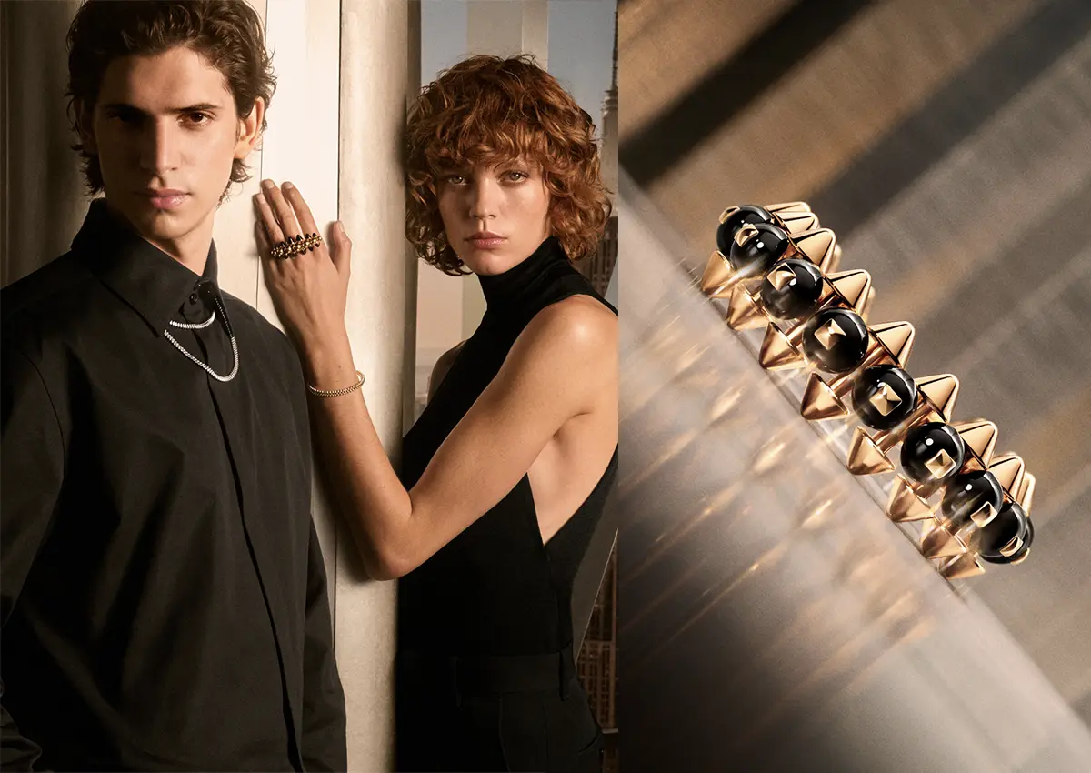 Clash de Cartier nakit iz rumenega zlata z geometrijskimi detajli in črnim oniksom.