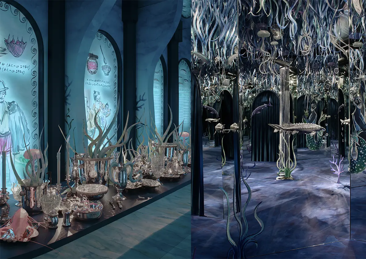 buccellati-milan-design-week-2026 Potopna instalacija Buccellati Aquae Mirabiles v Milanu z umetelno postavljenimi srebrnimi predmeti, morskimi motivi in modro osvetlitvijo.