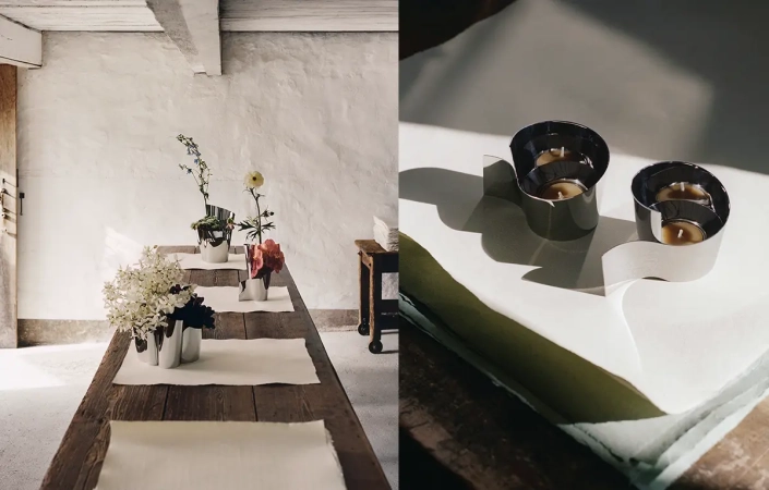 georg-jensen-fold Vaze in svečniki Georg Jensen Fold iz zrcalno poliranega jekla z oblikami, ki jih navdihujejo pregibi papirja